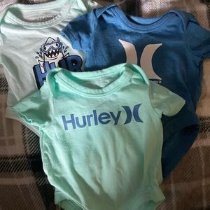 3 Hurley newborn onesies